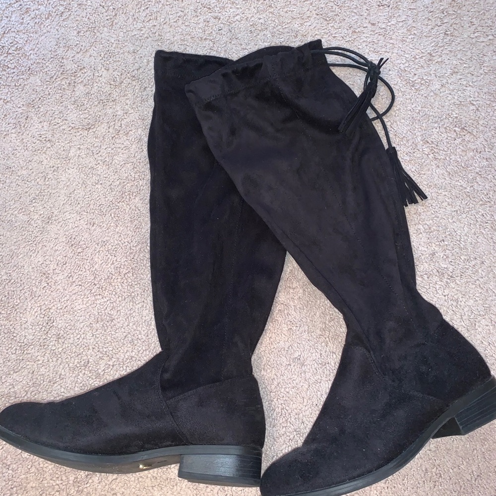 Tall black boots